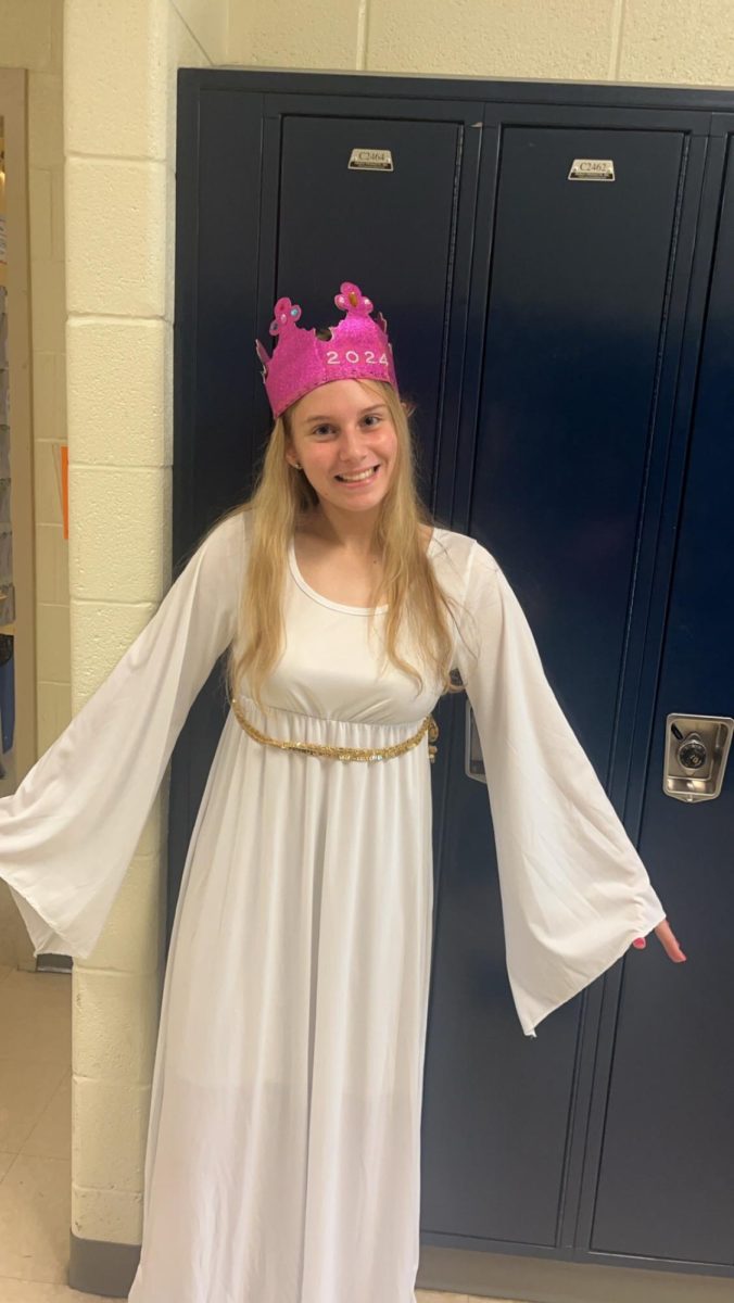 Homecoming was an amazing event here at BAHS last week, October 7th! The theme this year
was autumn masquerade! Lily Felton “Cannot wait for homecoming!” she says, “I am excited to
dress up for the theme!” she tells us.
Last Friday, the 6th of October, was Toga/Crown Day for the seniors here! Lily dressed up for the
theme and showed us her crown. “Pink is my favorite color!” Lily’s crown was covered in pink,
“I wanted my crown to have jewels as well.” Lily showed her spirit for Toga/Crown Day.
Seniors at BAHS have a lot of activities planned this school year! Seniors are ready to make their
school year memorable. “I am most excited for the field trip to Six Flags!” Lily says, “I have
never been before.” Lily is prepared to have a great time on the Six Flags field trip with the rest
of the seniors.