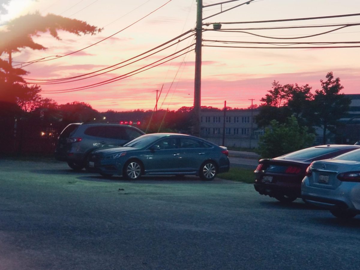 Cars In Parking Lot Sunset