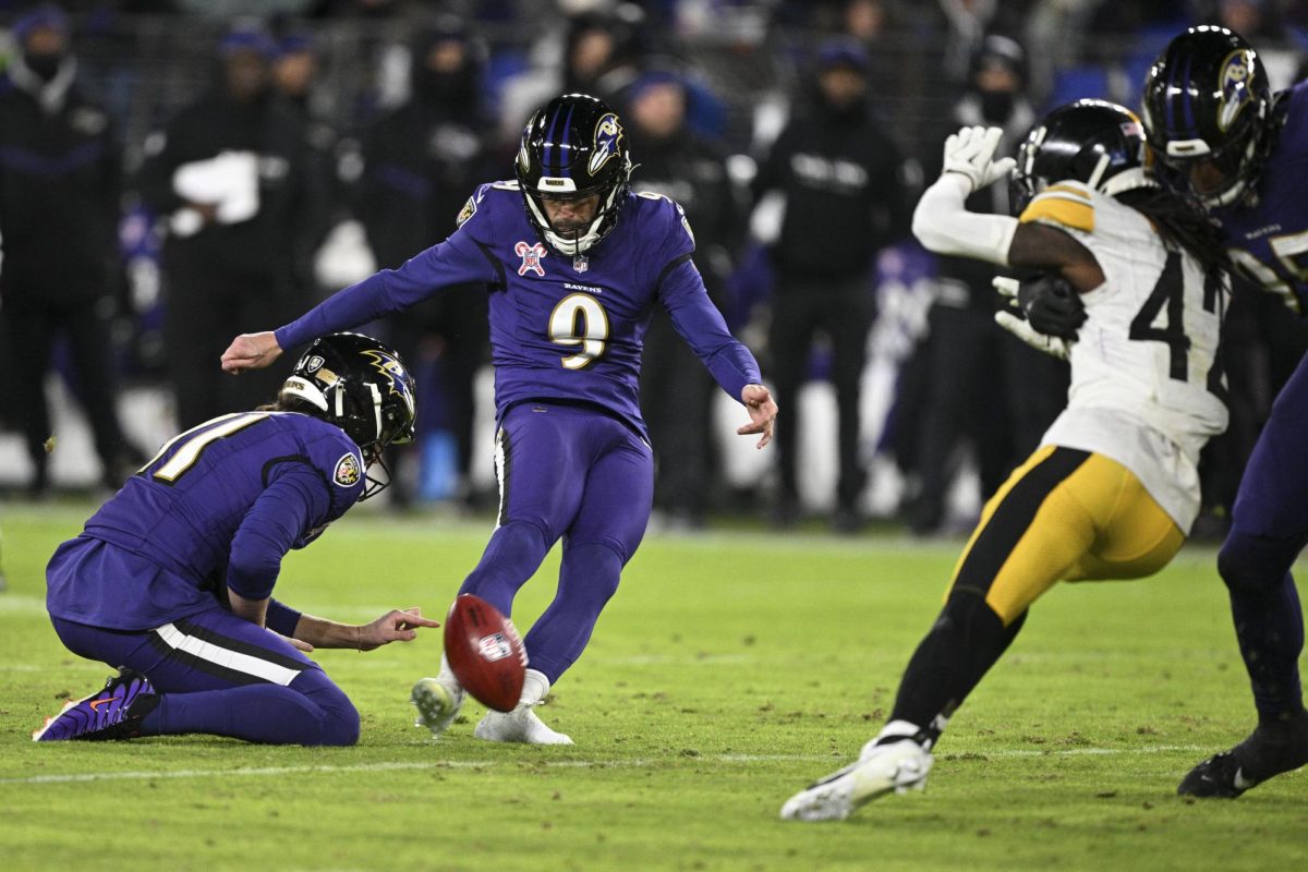 Dec 21, 2024; Baltimore, Maryland, USA;  Baltimore Ravens place kicker Justin Tucker (9) kicks a 50-yard field goal during the first half against the Pittsburgh Steelers at M&T Bank Stadium. Mandatory Credit: Tommy Gilligan-Imagn Images